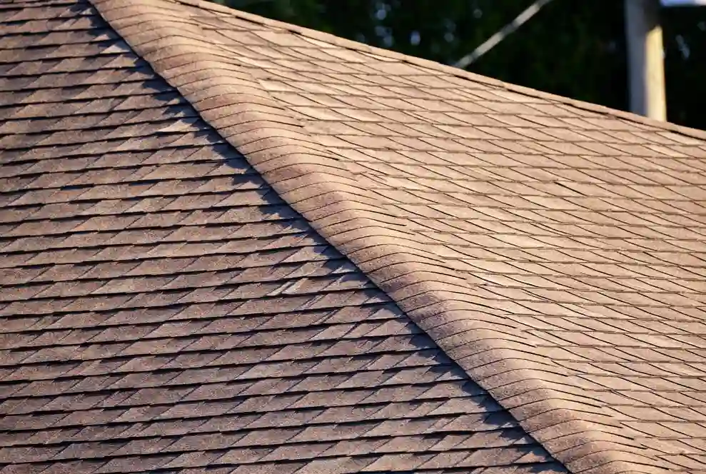 Brown asphalt shingle roof project completed by asphalt roofing contractor in the DMV area