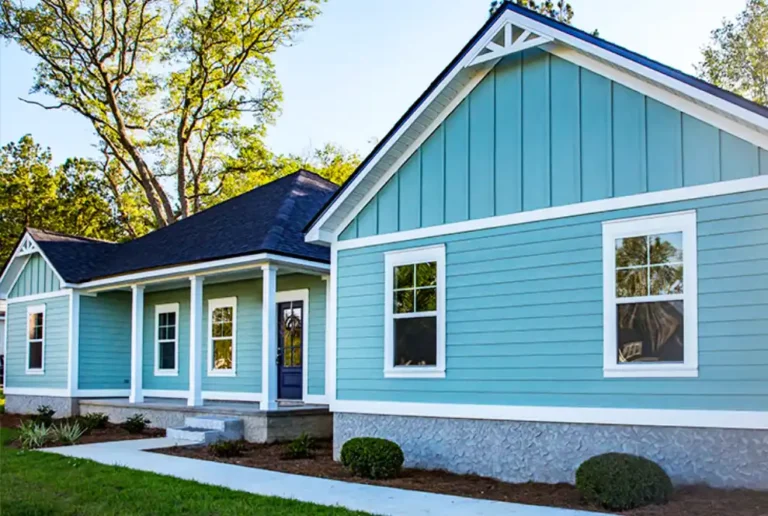 Blue house siding installation completed by residential siding contractor in the DMV area