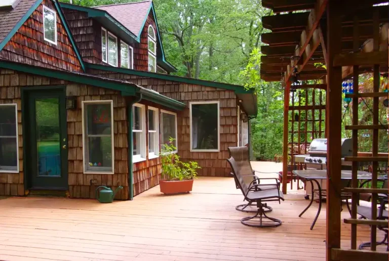 Cedar siding and roof on cabin-style home by siding contractor, built for Mid-Atlantic conditions