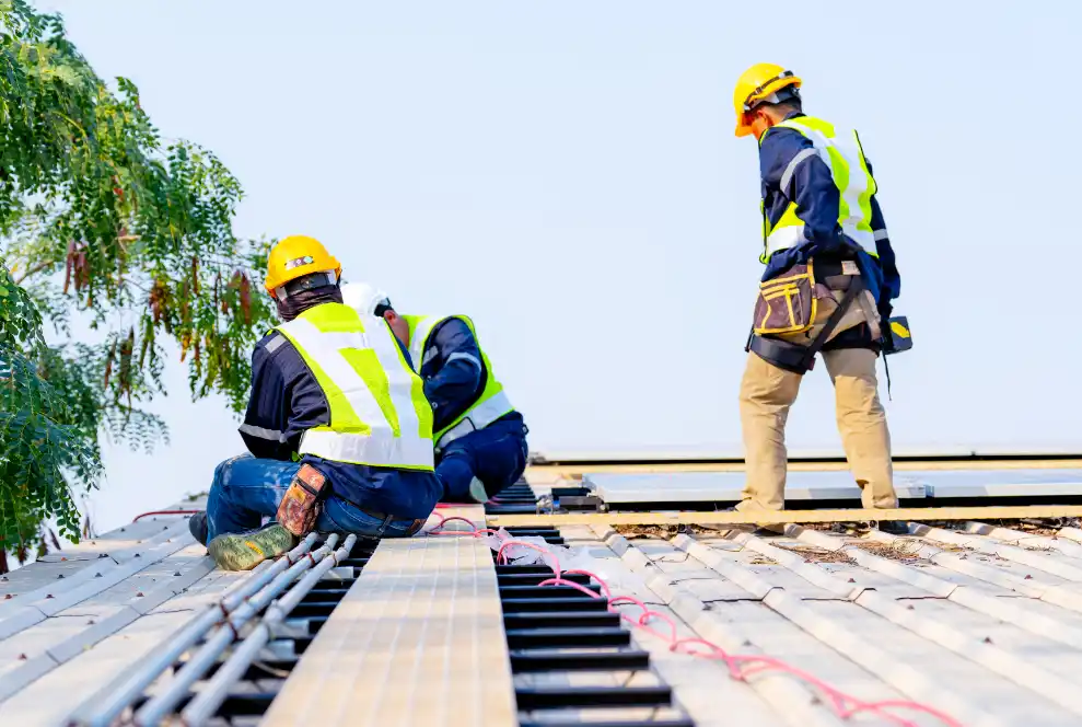 Solar panel services contractors installing solar panels on DMV property